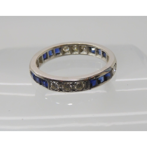 645 - A SAPPHIRE AND DIAMOND ETERNITY RING