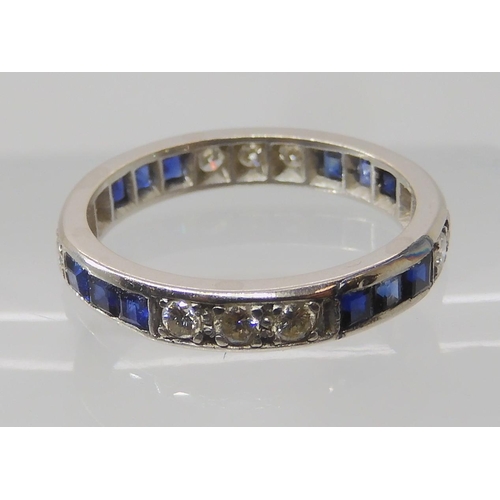 645 - A SAPPHIRE AND DIAMOND ETERNITY RING