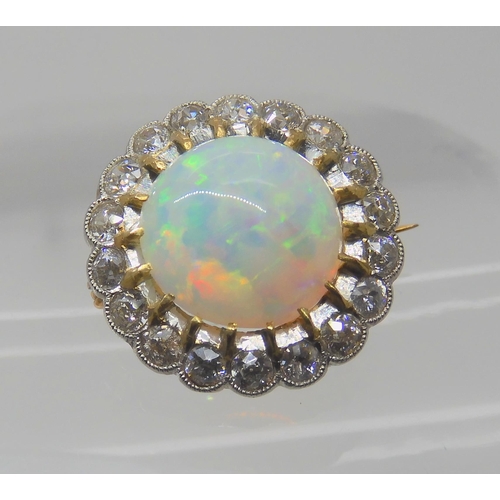 654 - AN OPAL AND DIAMOND BROOCH