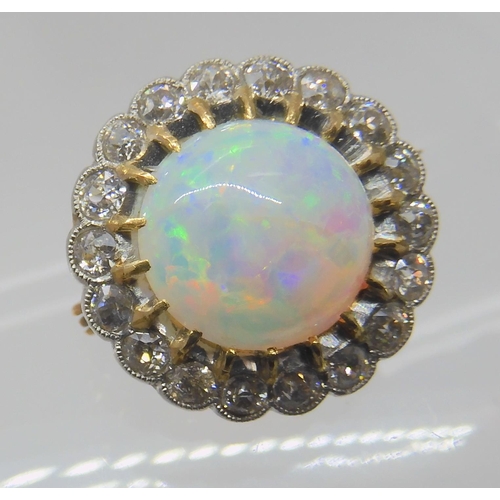 654 - AN OPAL AND DIAMOND BROOCH