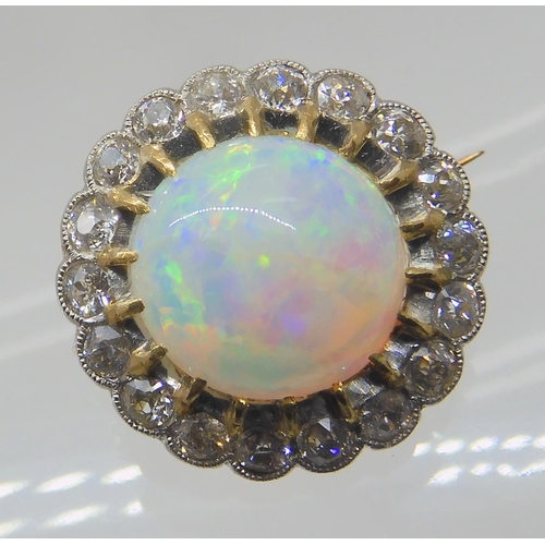 654 - AN OPAL AND DIAMOND BROOCH