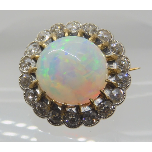 654 - AN OPAL AND DIAMOND BROOCH