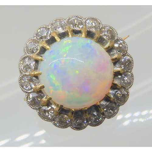 654 - AN OPAL AND DIAMOND BROOCH