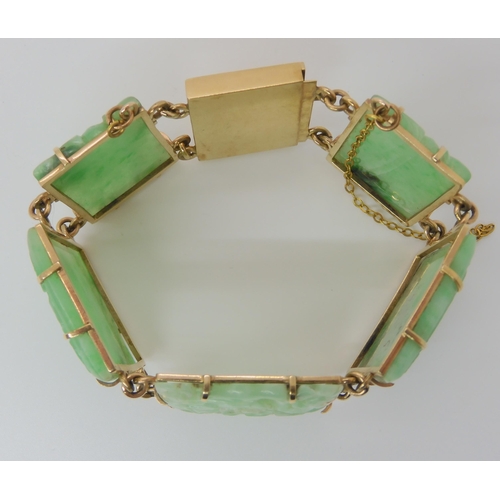 659 - A 9CT GOLD MOUNTED CHINESE GREEN HARDSTONE BRACELET