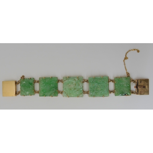 659 - A 9CT GOLD MOUNTED CHINESE GREEN HARDSTONE BRACELET