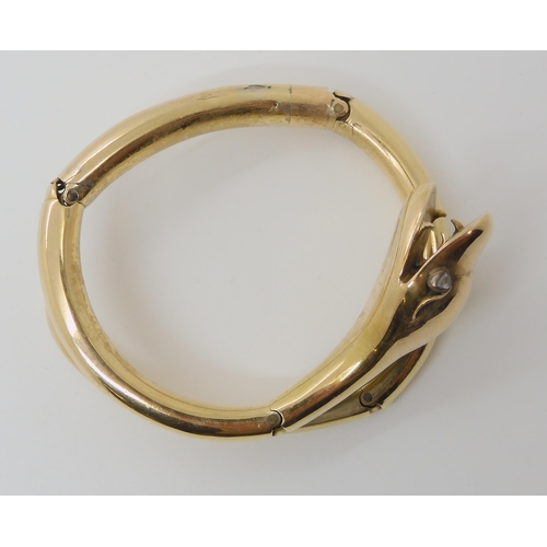 661 - A YELLOW METAL VICTORIAN ARTICULATED SNAKE BANGLE