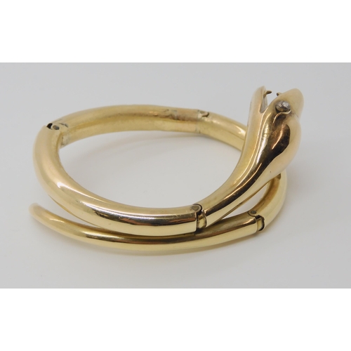 661 - A YELLOW METAL VICTORIAN ARTICULATED SNAKE BANGLE