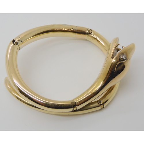 661 - A YELLOW METAL VICTORIAN ARTICULATED SNAKE BANGLE