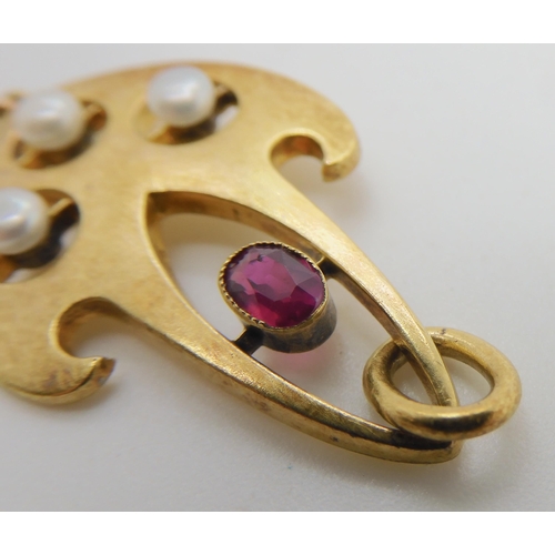 671 - A CONTINENTAL 14K ART NOUVEAU RUBY AND PEARL PENDANT