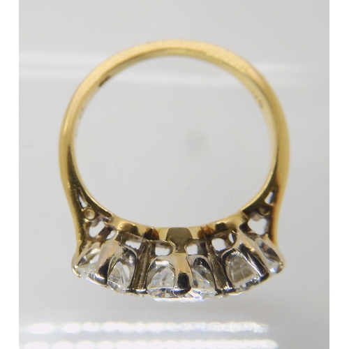 675 - AN 18CT GOLD THREE STONE DIAMOND RING