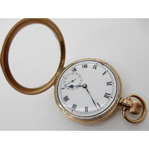 697 - A 9CT GOLD OPEN FACE POCKET WATCH