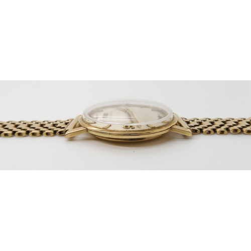 709 - A 9CT GOLD GENTS TISSOT WRISTWATCH