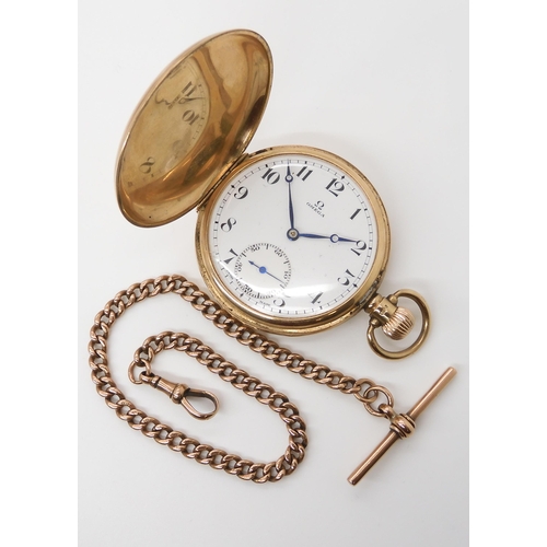 713 - A 9CT GOLD OMEGA FULL HUNTER POCKET WATCH AND CHAIN