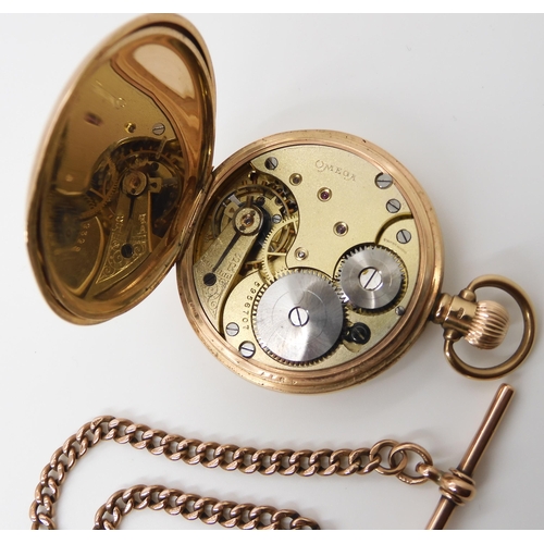 713 - A 9CT GOLD OMEGA FULL HUNTER POCKET WATCH AND CHAIN