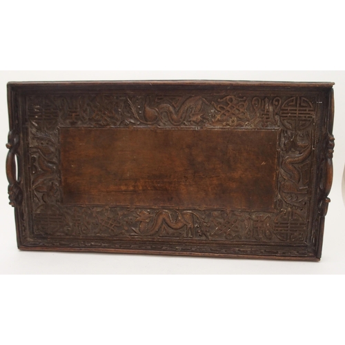 105 - A CHINESE HARDWOOD CARVED TEA TRAY