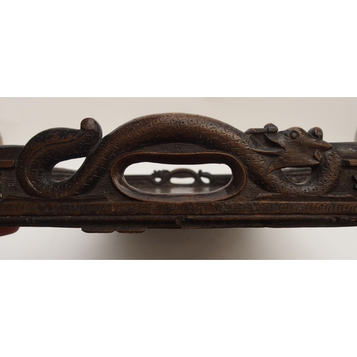 105 - A CHINESE HARDWOOD CARVED TEA TRAY