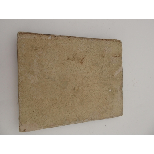 106 - AN ISNIK RELIEF MOULDED POTTERY TILE