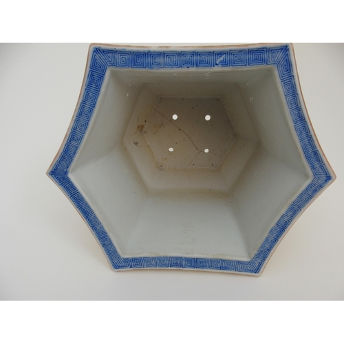 114 - A CHINESE FAMILLE JAUNE HEXAGONAL PLANTER