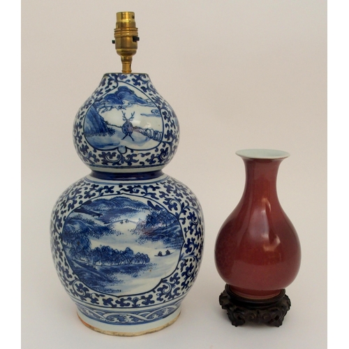 115A - A CHINESE BLUE AND WHITE DOUBLE GOURD VASE