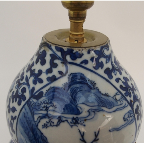 115A - A CHINESE BLUE AND WHITE DOUBLE GOURD VASE