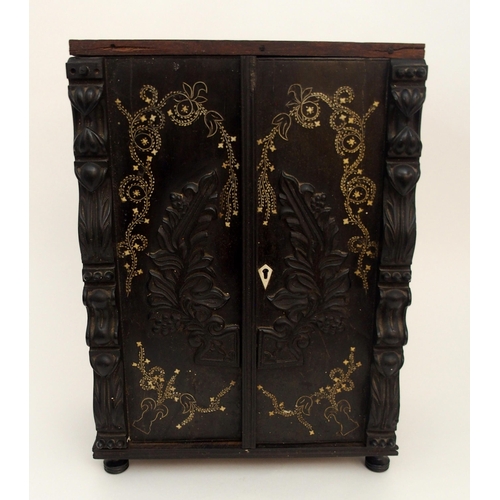 116 - AN ANGLO INDIAN EBONY TABLE CABINET