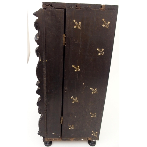 116 - AN ANGLO INDIAN EBONY TABLE CABINET