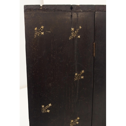 116 - AN ANGLO INDIAN EBONY TABLE CABINET