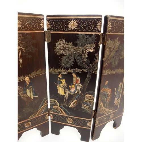 116A - A CHINESE LACQUERED FOUR-FOLD TABLE SCREEN