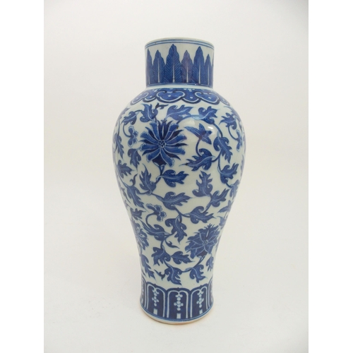 66 - A CHINESE BLUE AND WHITE BALUSTER VASE