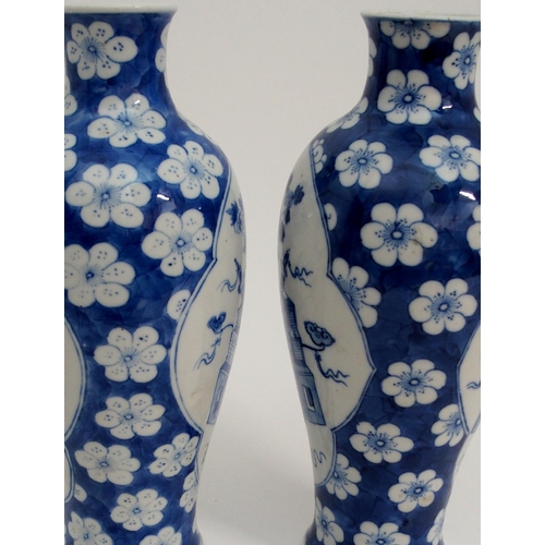 69 - A PAIR OF CHINESE BLUE AND WHITE BALUSTER VASES