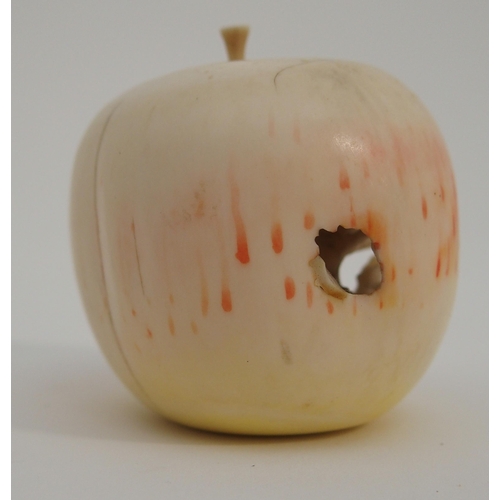 74 - A CHINESE CARVED APPLE