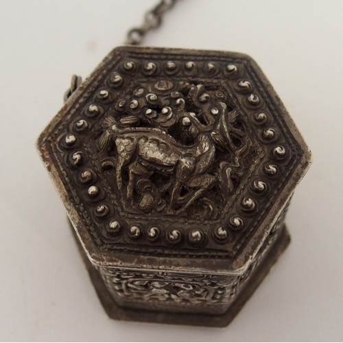 87 - AN ASIAN WHITE METAL HEXAGONAL BOX