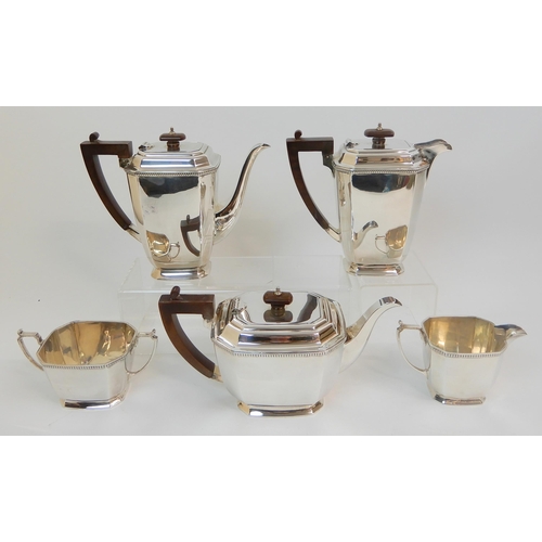 157 - A MATCHED FIVE PIECE SILVER TEA AND COFFEE SERVICE