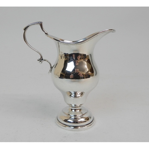 167 - A SILVER CREAM JUG