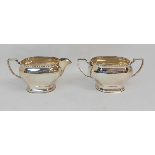 170 - A THREE PIECE SILVER TEA SERVICE