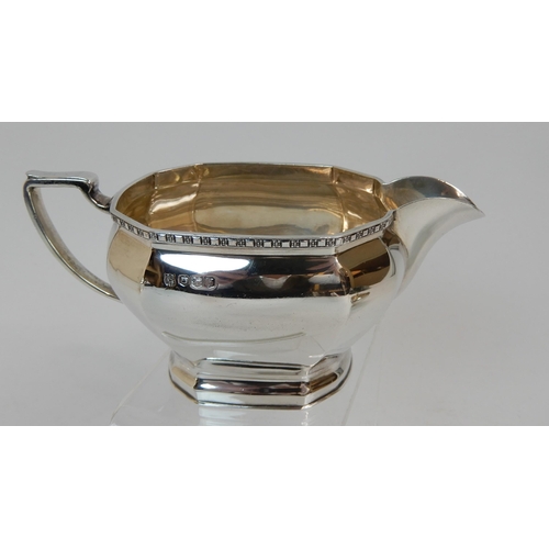 170 - A THREE PIECE SILVER TEA SERVICE