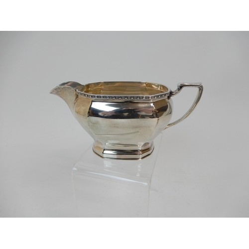 170 - A THREE PIECE SILVER TEA SERVICE