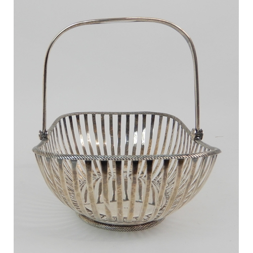 176 - A SILVER SWING HANDLED BREAD BASKET