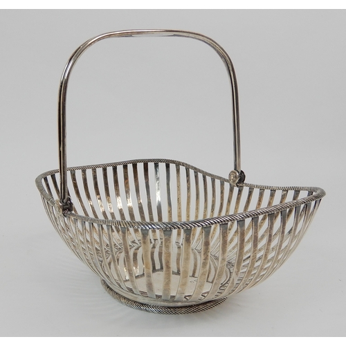 176 - A SILVER SWING HANDLED BREAD BASKET