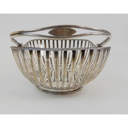 176 - A SILVER SWING HANDLED BREAD BASKET