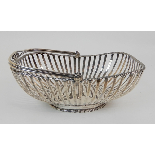 176 - A SILVER SWING HANDLED BREAD BASKET