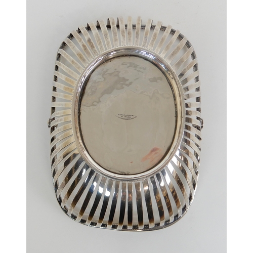 176 - A SILVER SWING HANDLED BREAD BASKET