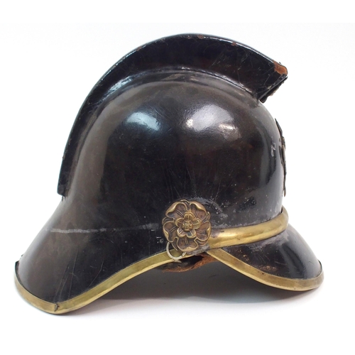 254 - A VINTAGE FIRE BRIGADE HELMET