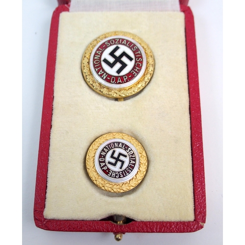 267 - A CASED GERMAN NATIONAL SOCIALIST PARTY MEMBER'S GOLDEN PARTY BADGE