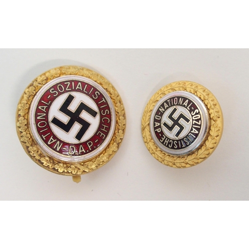 267 - A CASED GERMAN NATIONAL SOCIALIST PARTY MEMBER'S GOLDEN PARTY BADGE