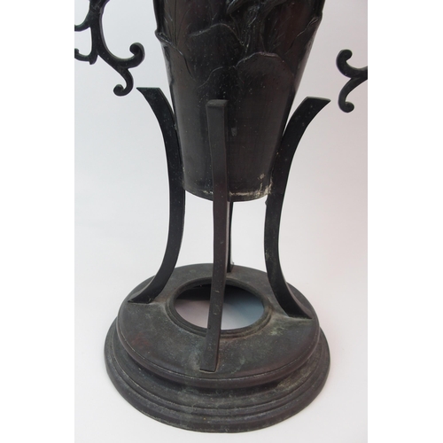 33 - AN ASIAN BRONZE TWO-HANDLED VASE