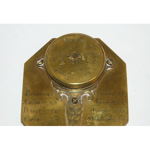 331 - AN 18TH CENTURY FRENCH BRASS OCTAGONAL FOUR-SCALE POCKET COMPASS AND SUNDIAL