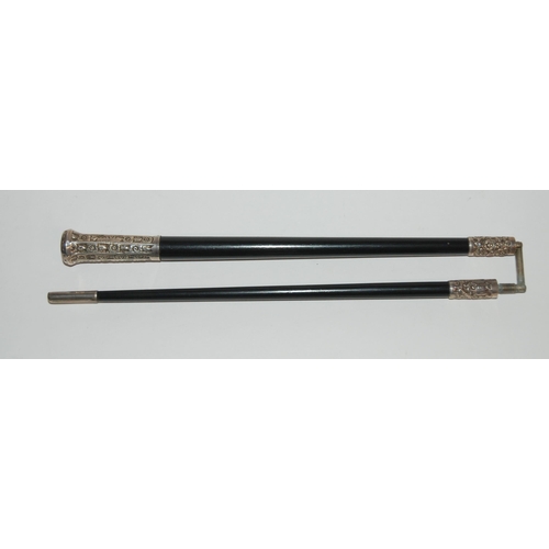 336 - AN EBONY AND SILVER-MOUNTED CONDUCTOR'S BATON