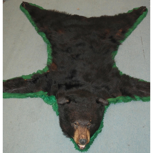 373 - A BROWN BEAR SKIN RUG