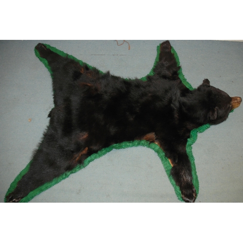 373 - A BROWN BEAR SKIN RUG